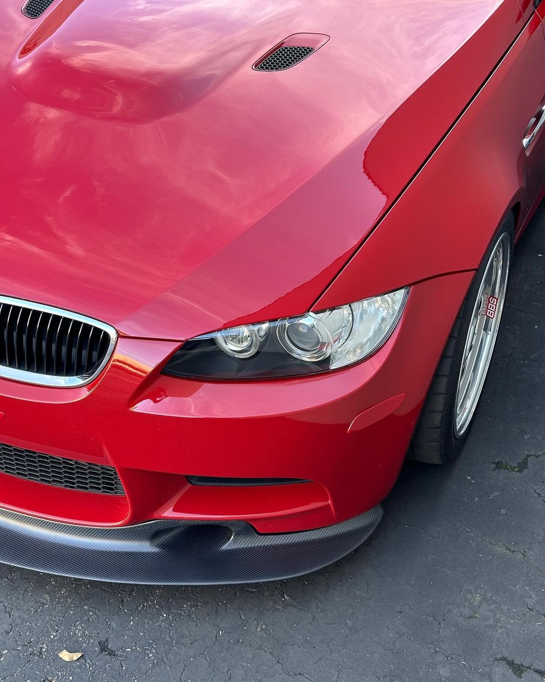 Ridgeline Motorsport E9X M3 GT4 V1 front splitter spoiler on a car, showcasing aerodynamic enhancement for the BMW M3 E9X.