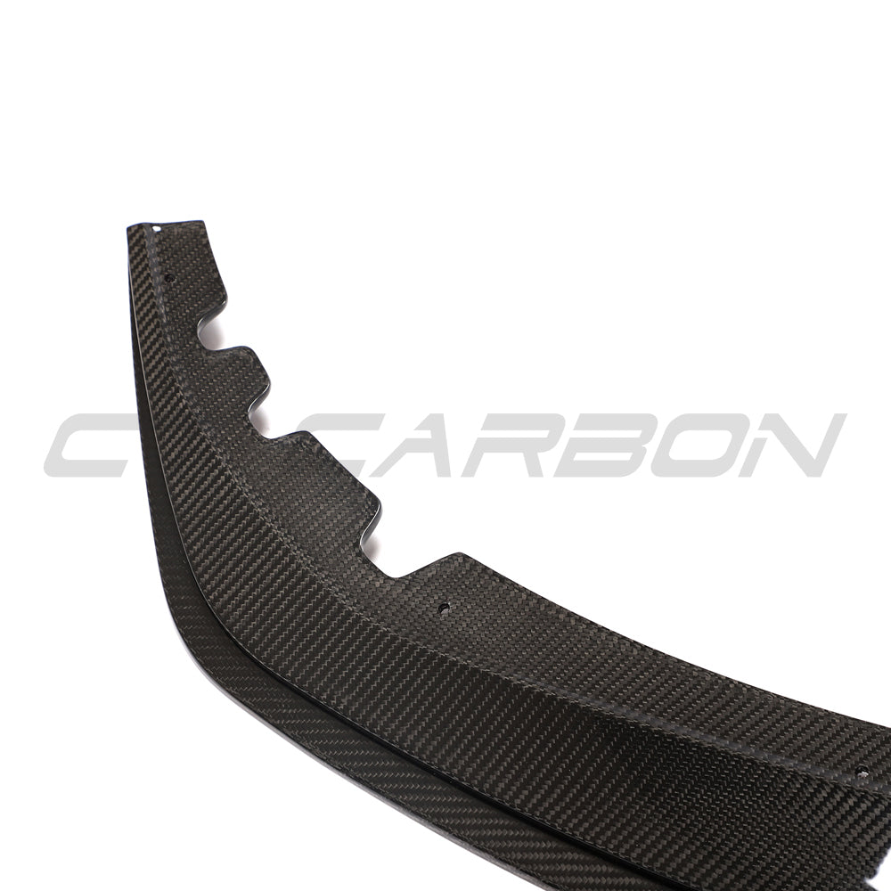 BMW G22 4 Series 2020+ CT Carbon fiber kit installed on car, showcasing sleek, glossy carbon fiber accents and detailed craftsmanship.