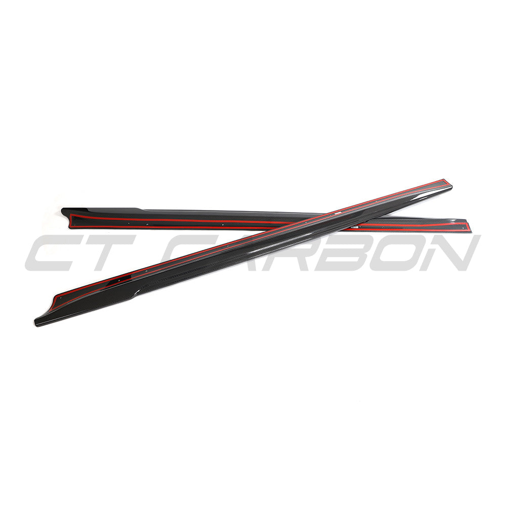 Tesla Model 3 2023+ carbon fiber side skirts by CT Carbon, showing sleek, aerodynamic design attached to the vehicle's sides.