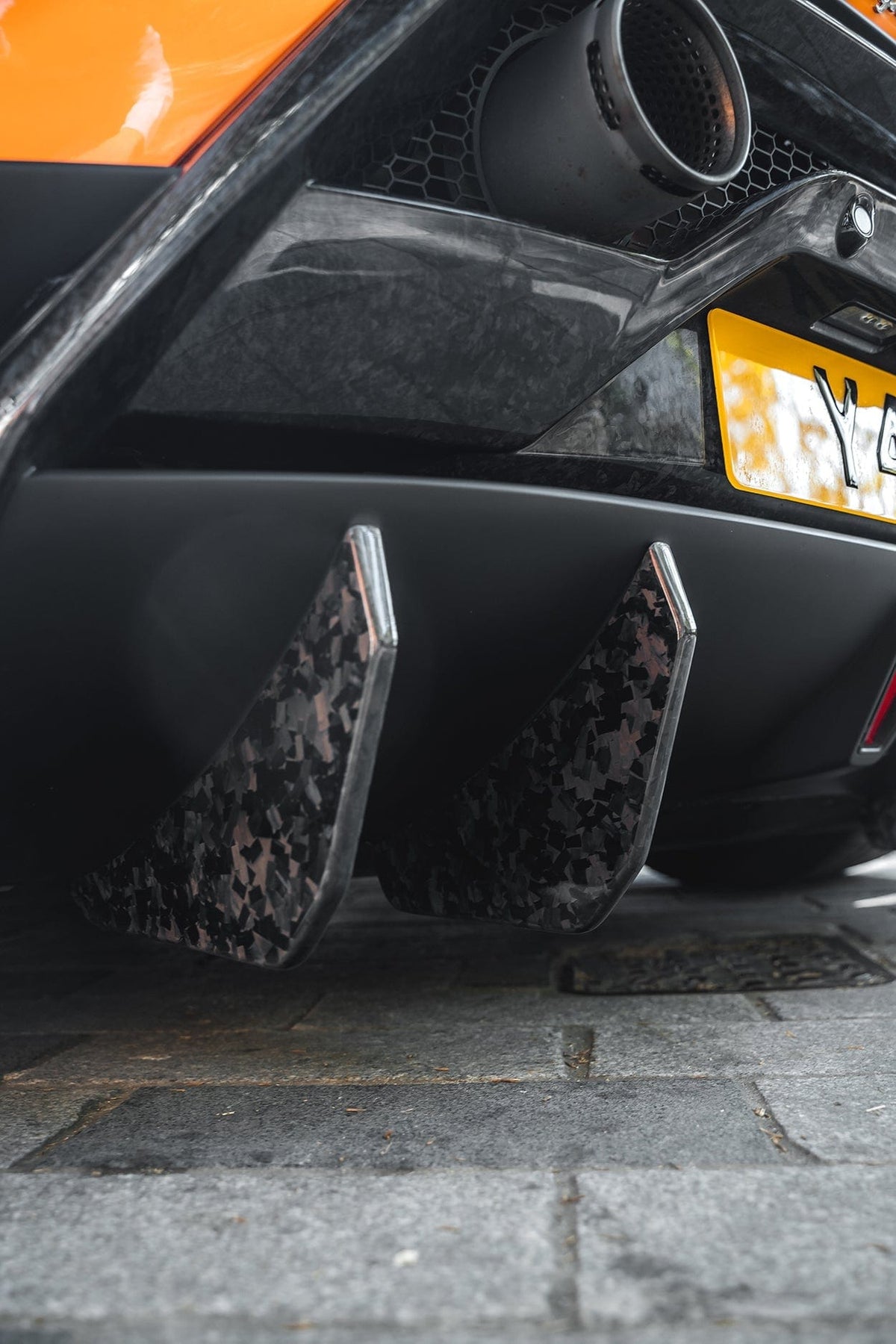 Lamborghini Huracan Performante diffuser extensions by CT Design, crafted from carbon fiber, installed on the rear diffuser.
