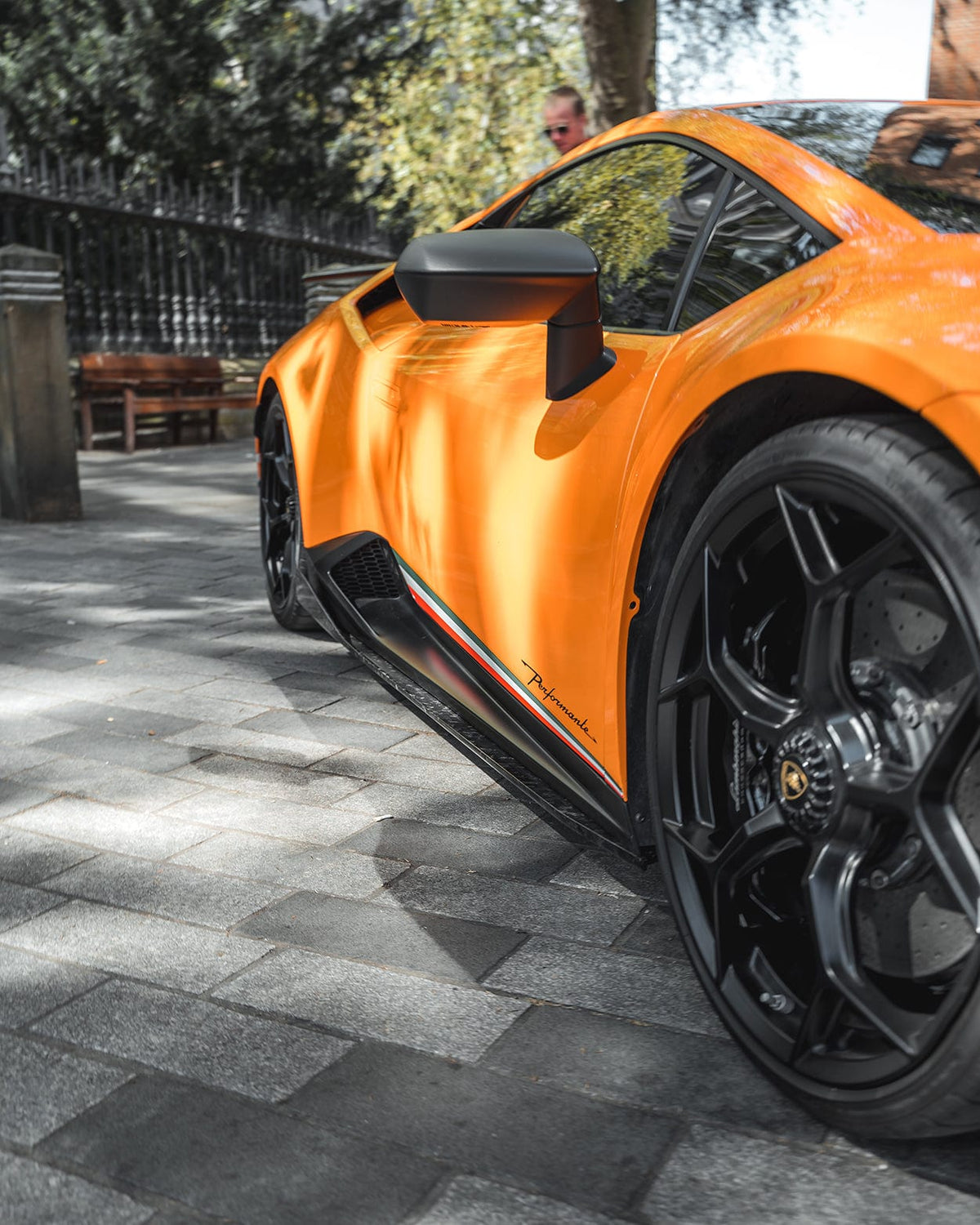 Lamborghini Huracan Performante forged side skirts by CT Carbon, detailed carbon fiber design on a sleek sports car.