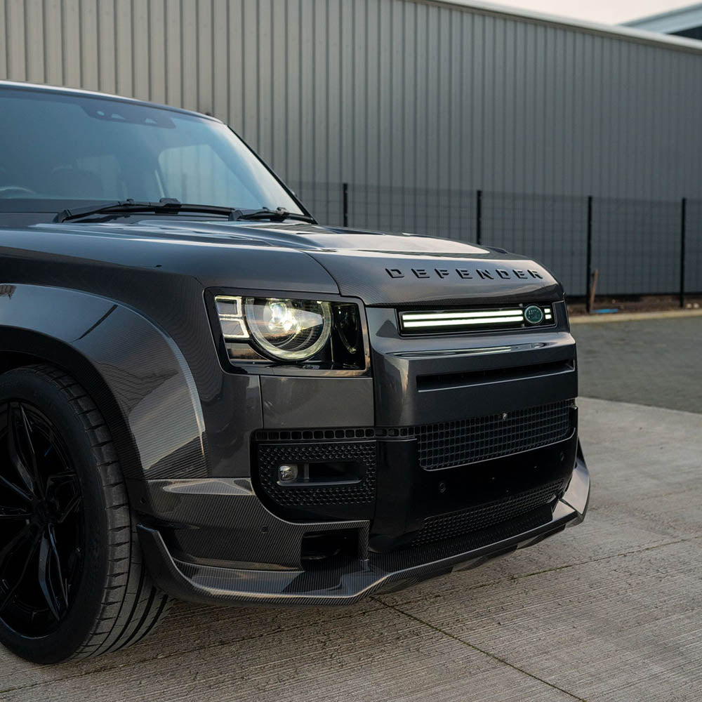 Full view of the CT Carbon Land Rover Defender L663 110 wide arch kit made from carbon fiber with wide arches and detailing.