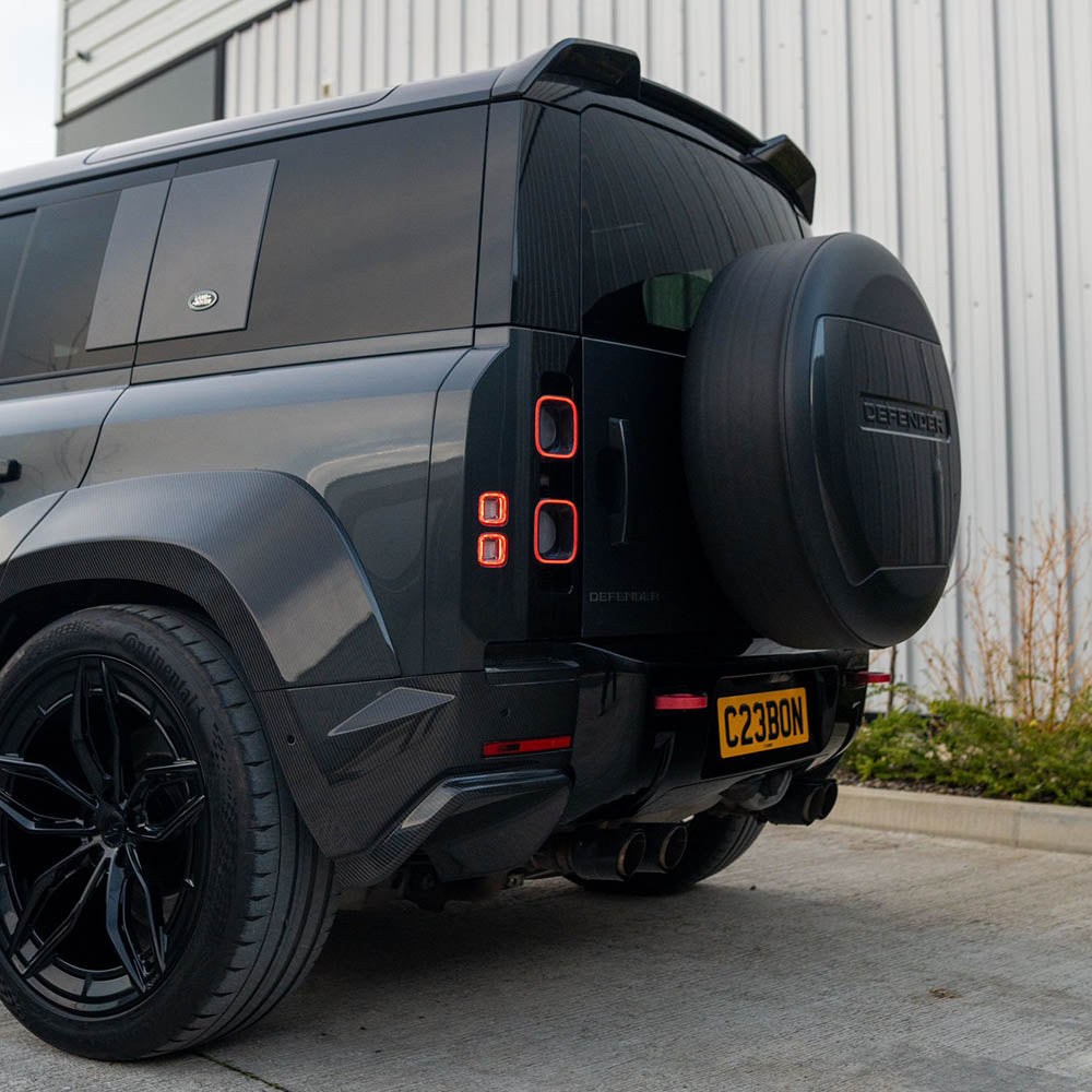Land Rover Defender L663 110 wide arch kit made of full carbon fibre, designed by CT Carbon, installed on the vehicle.