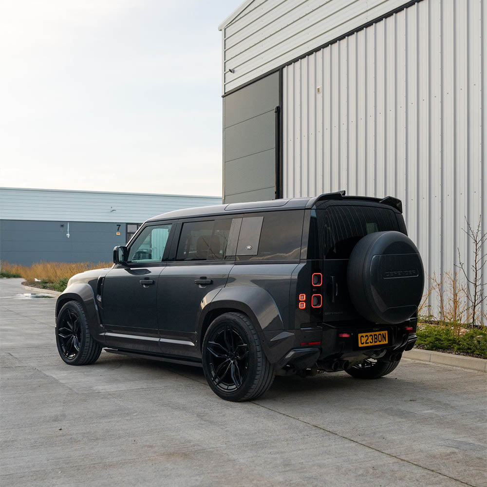 Land Rover Defender L663 110 full carbon fiber wide arch kit by CT Design, featuring sleek, lightweight carbon fiber fender extensions.