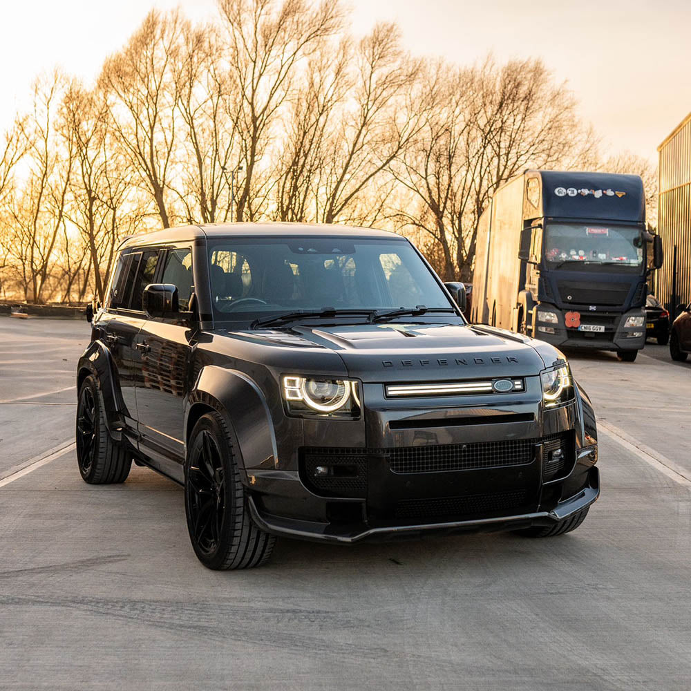 Carbon fiber wide arch kit for Land Rover Defender L663 110 by CT Design, showcasing full carbon fiber panels and wide arch design.