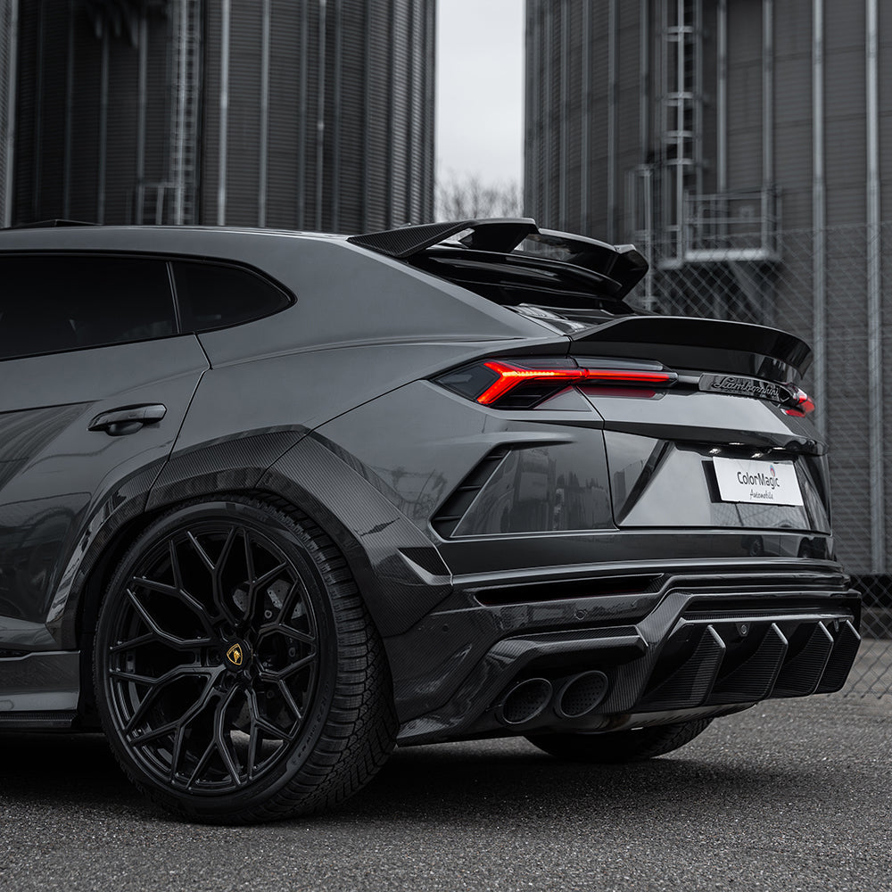 Lamborghini Urus carbon fiber diffuser by CT Carbon, showcasing sleek, lightweight automotive diffuser with textured carbon fiber finish.