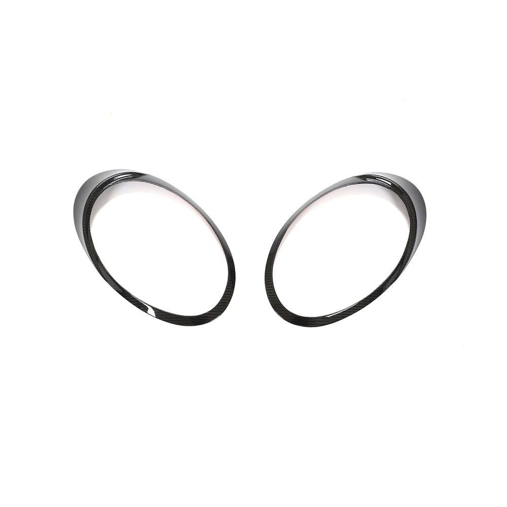 CT Carbon Porsche 991 911 2012-2021 carbon fibre headlight eyebrows accessory showing sleek, aerodynamic design on car headlights.