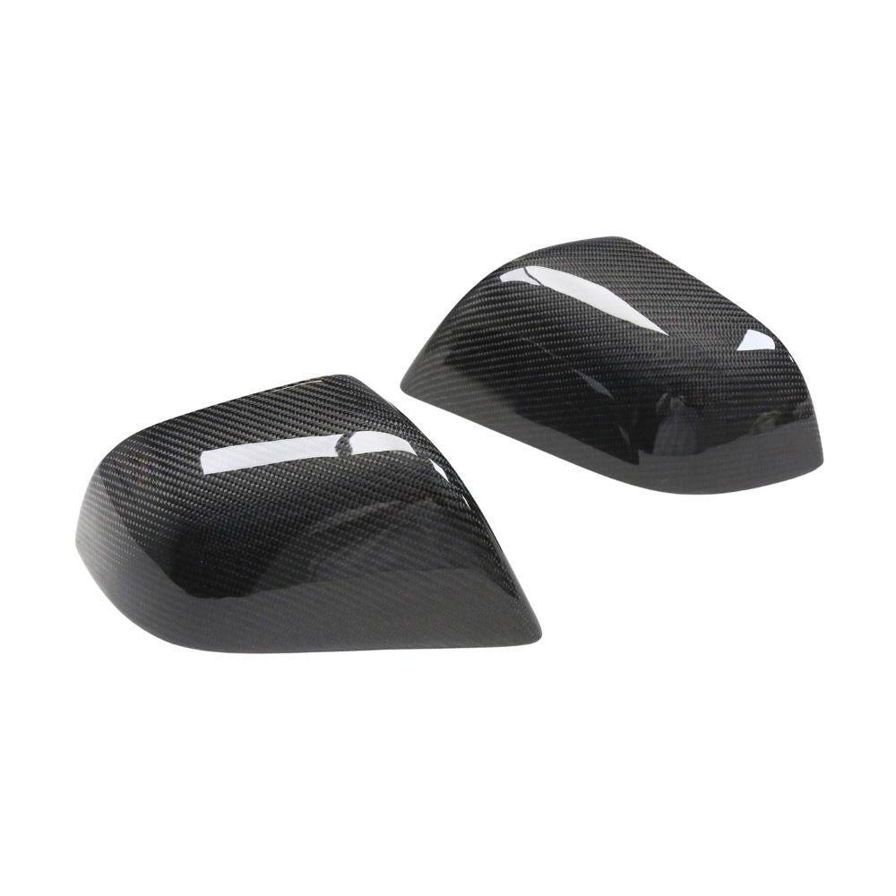Tesla Model 3 2017-2023 carbon fiber mirror covers by CT Carbon, showcasing sleek, lightweight accessories for vehicle mirrors.
