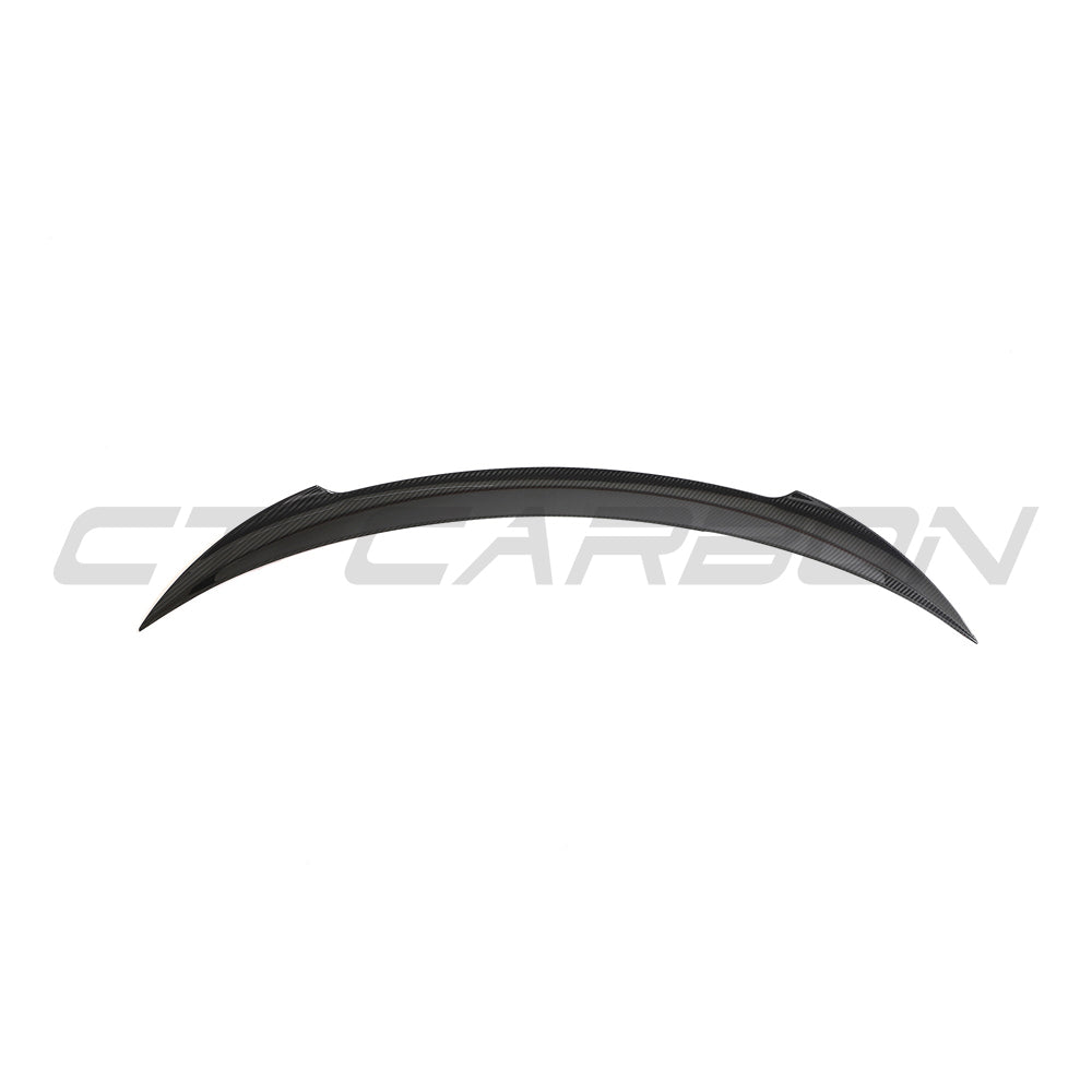 Tesla Model 3 2023+ carbon fiber spoiler by CT Carbon, V2, shown on the car's rear with a sleek, aerodynamic design.