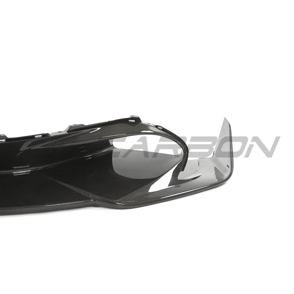 McLaren 720S full carbon fiber kit by CT Design V3, featuring a sleek carbon fiber splitter and aerodynamic enhancements.