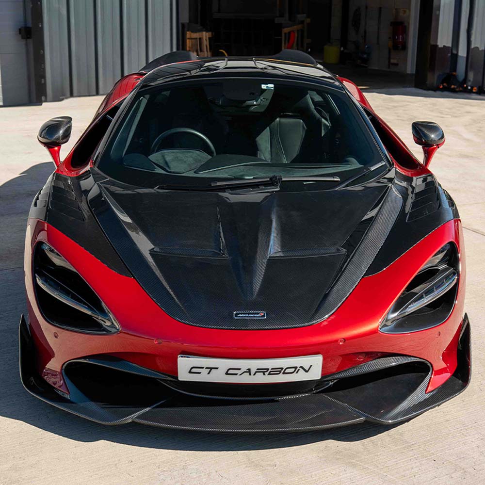 McLaren 720S full carbon kit by CT Carbon, featuring carbon fiber splitter and aerodynamic components, installed on the sports car.