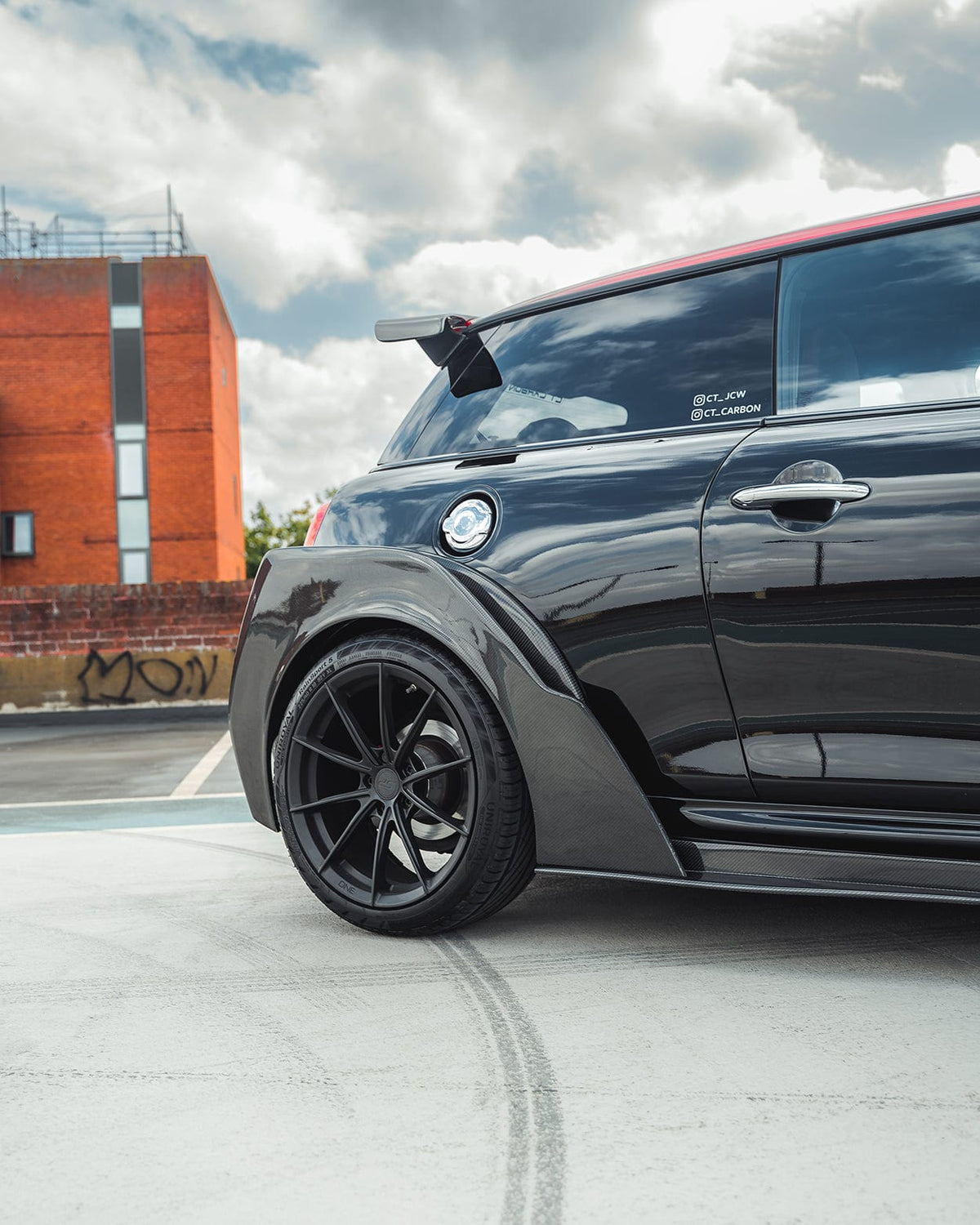 Carbon fiber wide arch kit for MINI Cooper S F56 JCW Sport Pack by CT Carbon, shown installed on the vehicle's body.
