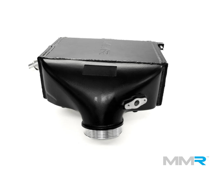 MMX Performance top mount charge cooler for BMW S55 F8x M2C M3 M4 showing the sleek black cooling unit with mounting hardware.