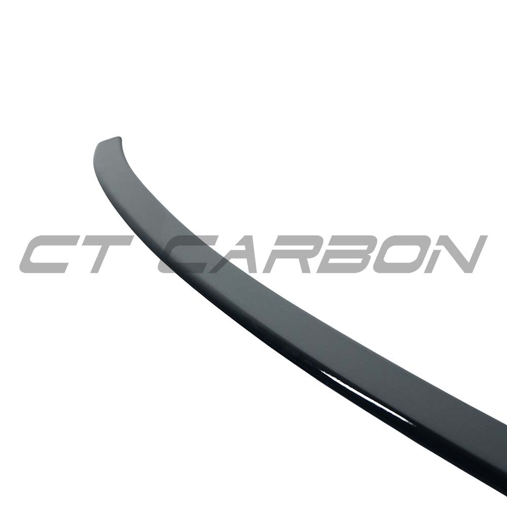 BMW 4 Series G22 CT Carbon gloss black spoiler V1, sleek aerodynamic car spoiler with a smooth, shiny finish.