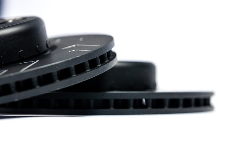 Rear BMW F2x F3x brake discs by MMX Performance, designed for fast road use, showing the vented rotor with mounting holes.