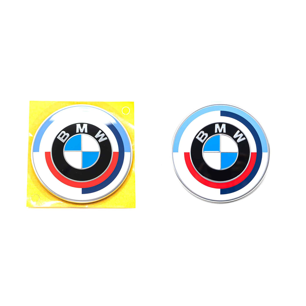 Genuine BMW 50 Years of M front and rear badge emblem for G80 M3, anniversary edition, shown on car detail.
