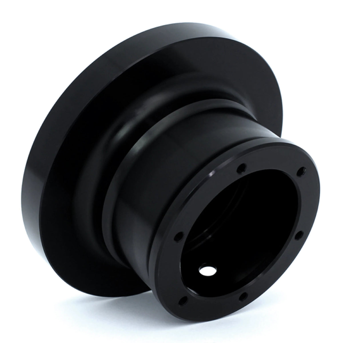 KMP Clubsport BMW FXX steering wheel hub, close-up view showing the black steering wheel with metal accents and mounting details.