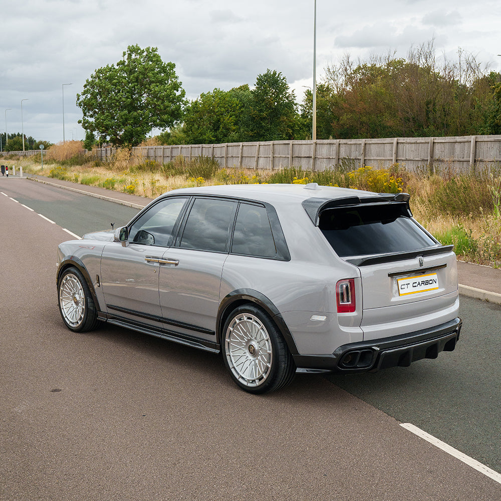 Rolls-Royce Cullinan carbon fibre roof spoiler with CT Design branding, showcasing sleek, aerodynamic design on a luxury SUV.