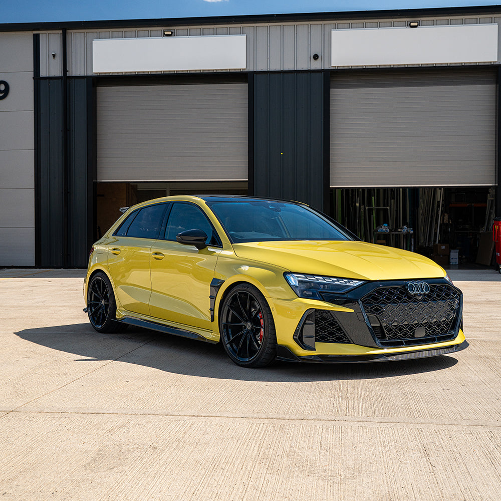 Audi RS3 8Y 2025+ carbon fibre splitter by CT Carbon, showcasing its sleek aerodynamic design for the facelift model.