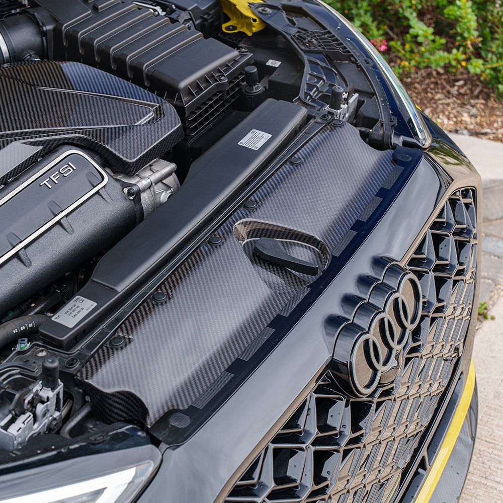 Carbon fibre engine bay scuttle trim for Audi RS3 8Y 2020+ by CT Carbon, shown installed in the engine compartment.