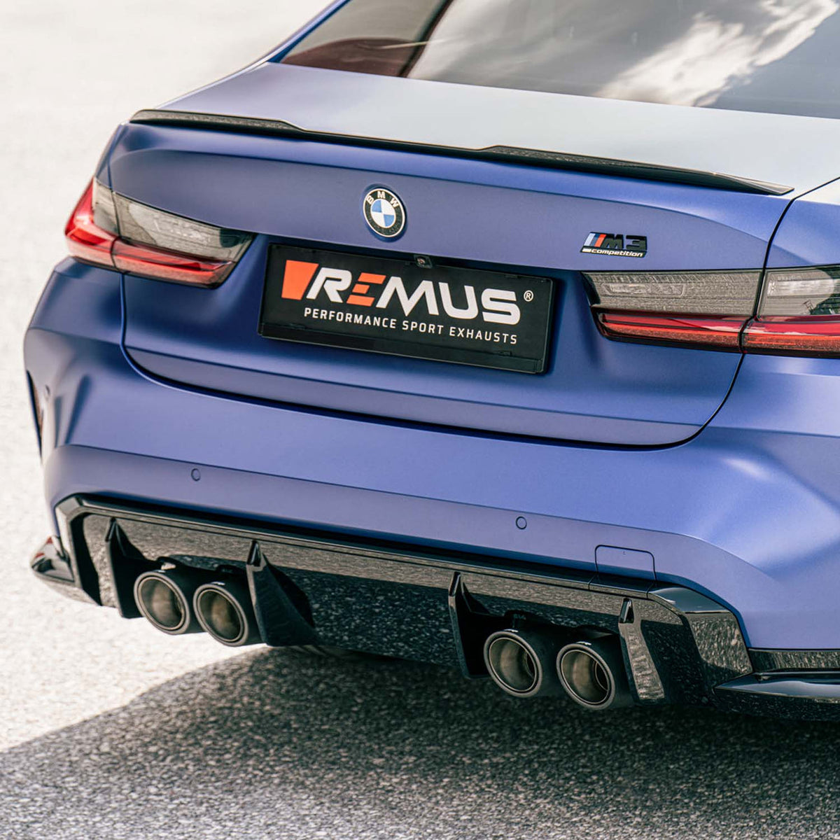 Remus BMW G80 M3 and G82 M4 turbo back racing exhaust system with downpipe for enhanced performance and aggressive sound.