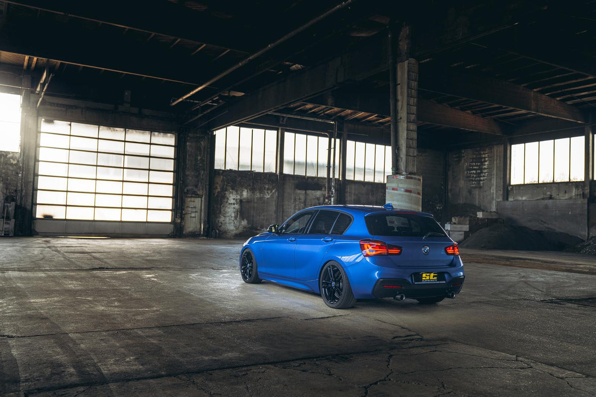 ST Suspension coilovers for BMW F20/F21 M140i, F30/F31 340i, and F32/F33 440i models, showing the adjustable suspension components.