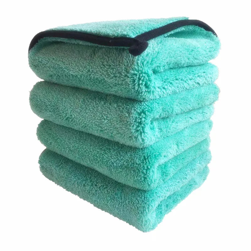 Nineteen72 Performance 72Detailing microfiber drying towel spread out on a surface, showing its soft, absorbent texture for car drying.