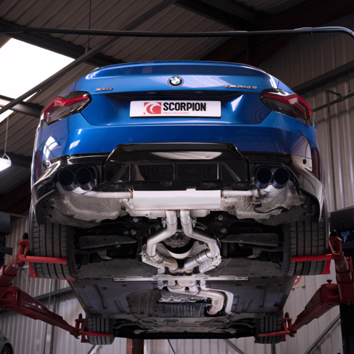 Scorpion BMW M240i G42 OPF back exhaust system with dual chrome tips and black finish, mounted on vehicle.