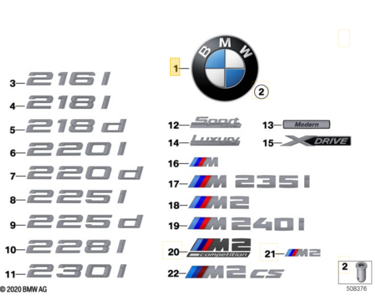 Genuine BMW front and rear badge emblems for F87 M2 and M2 Competition with BMW logo and lettering, displayed on a car.