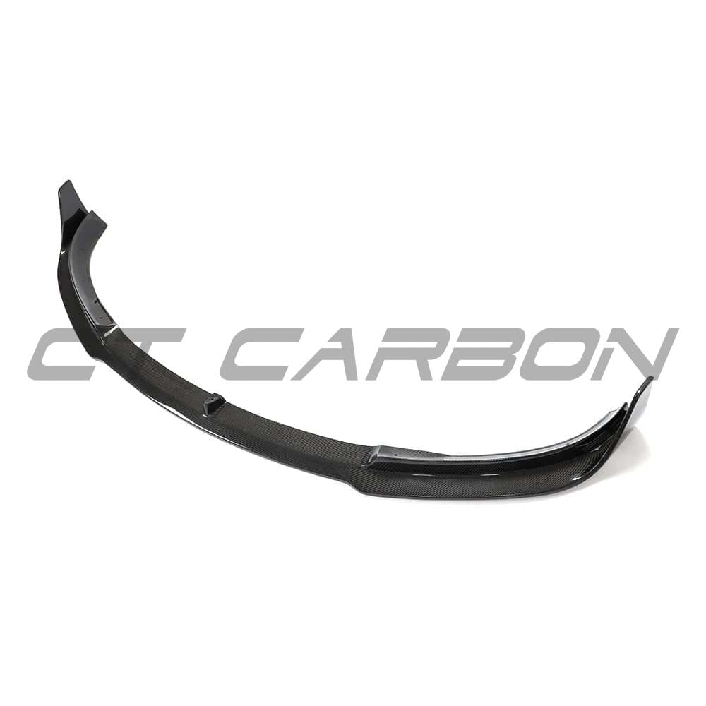 Tesla Model 3 2017-2023 CT Carbon V2 carbon fiber splitter installed on the front bumper, showcasing sleek aerodynamic design.