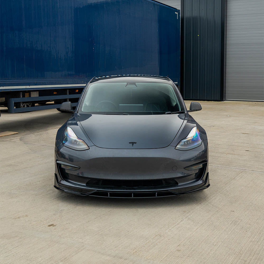 Tesla Model 3 full gloss black kit by CT Carbon, featuring sleek black exterior accessories and trim for a stylish look.