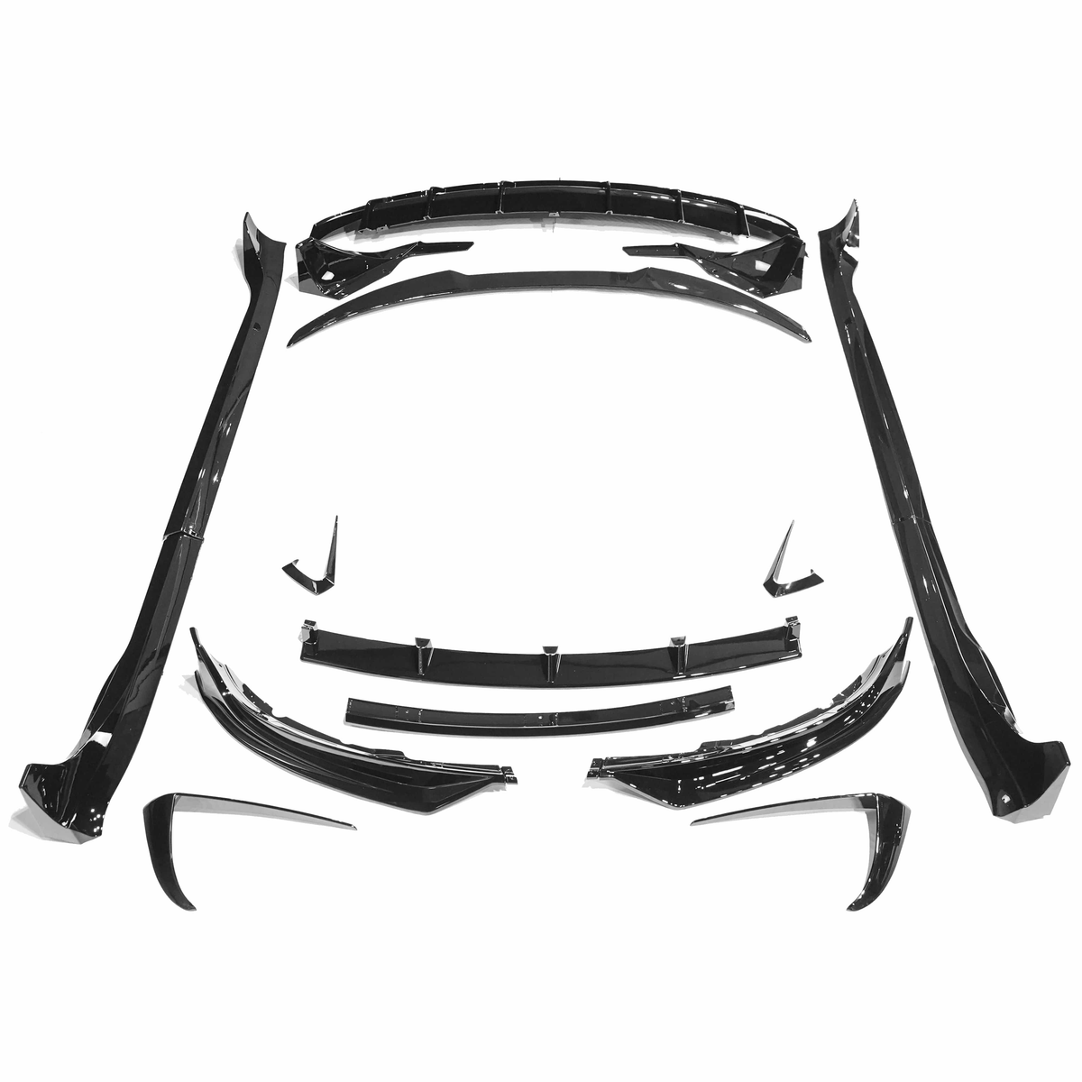 Full gloss black car kit for Tesla Model 3 by CT Carbon, featuring sleek black exterior accents and accessories.