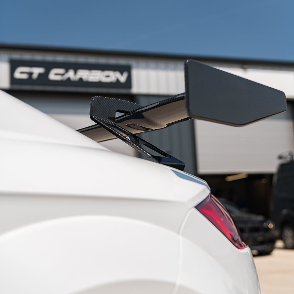 Carbon fibre spoiler for Audi TT/TTS/TTRS Quattro MK3 2015-2020 by CT Carbon, showing sleek aerodynamic design on a sports car.
