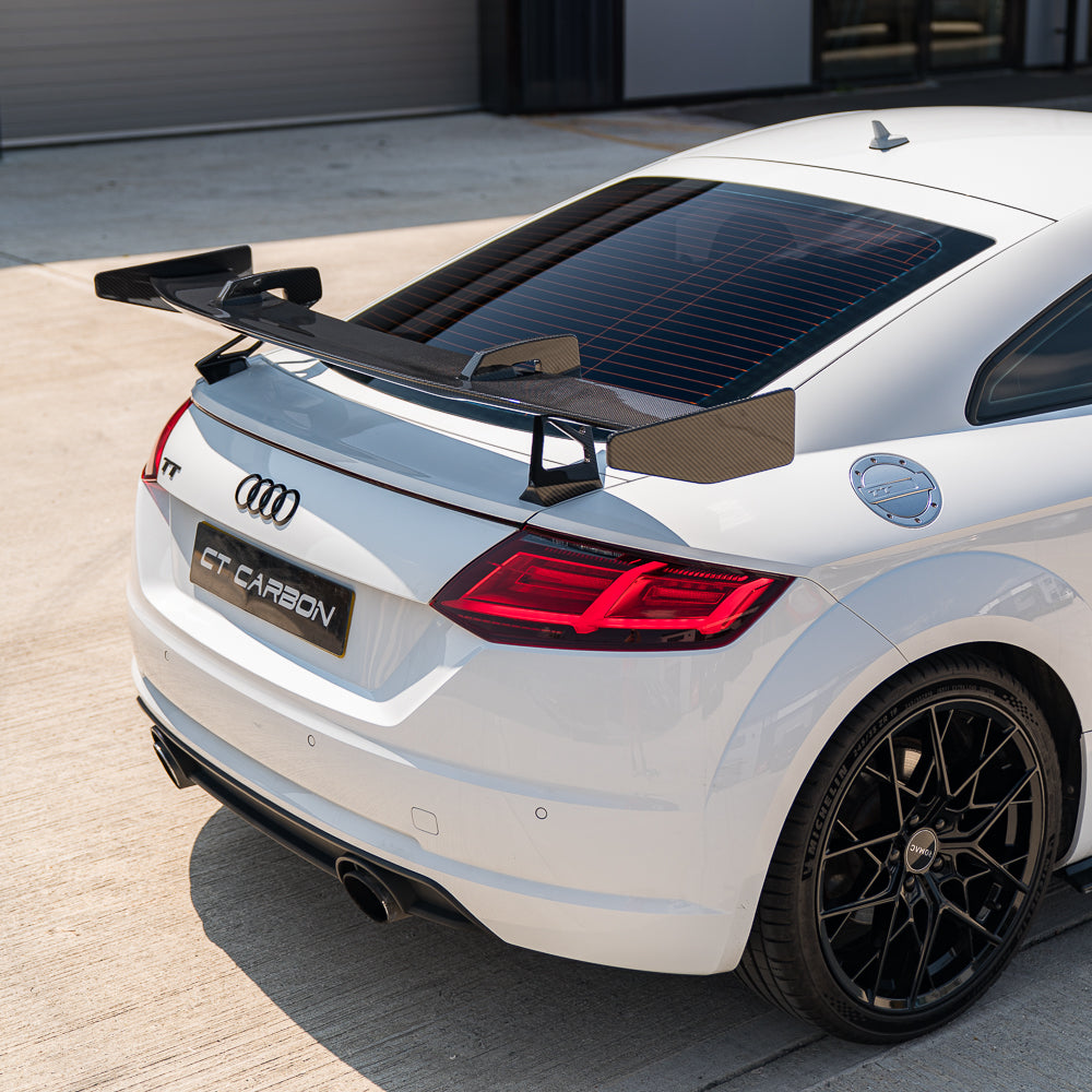 Carbon fiber wing spoiler for Audi TT/TTS/TTRS Quattro MK3 2015-2020 by CT Carbon, with a sleek black finish and aerodynamic design.