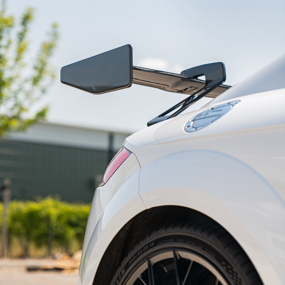 Carbon fiber wing spoiler for Audi TT/TTS/TTRS Quattro MK3 2015-2020 by CT Carbon, shown from a side view.