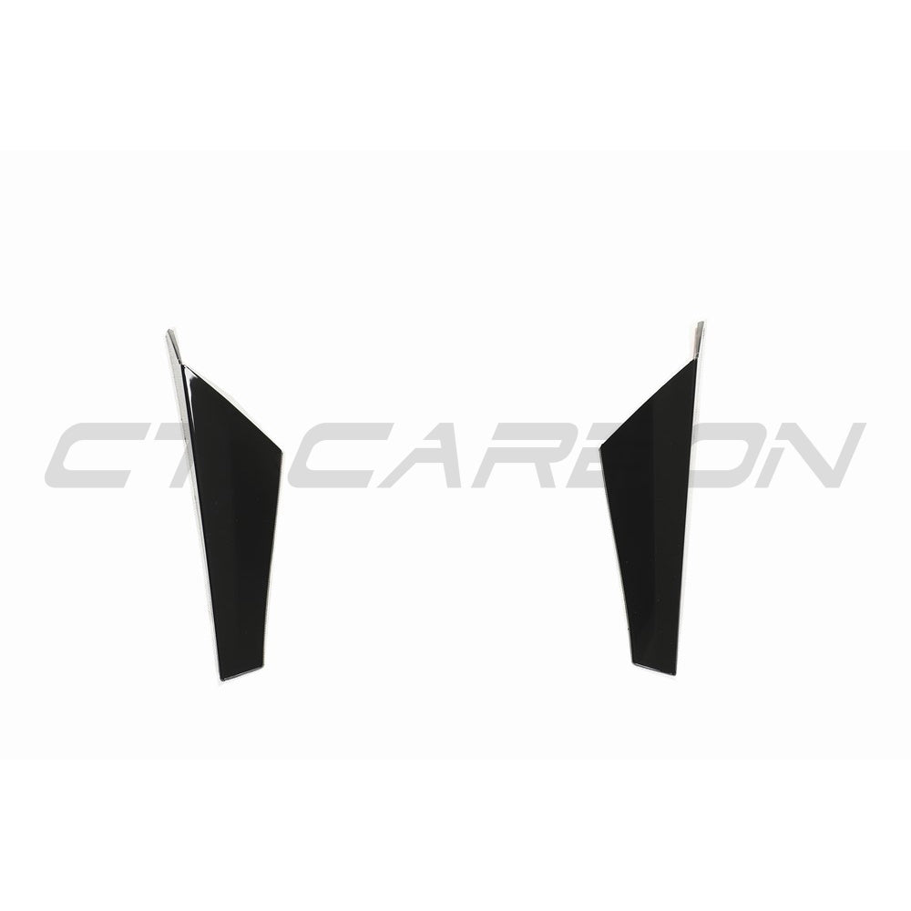 Volkswagen Golf MK8 CT Carbon gloss black rear window trim accessory installed on the vehicle's rear window.