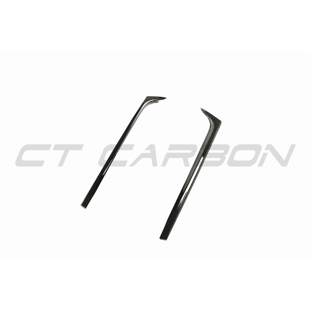 Volkswagen Polo MK5 gloss black rear window trim accessory by CT Carbon, showing close-up of sleek, shiny car window trim.