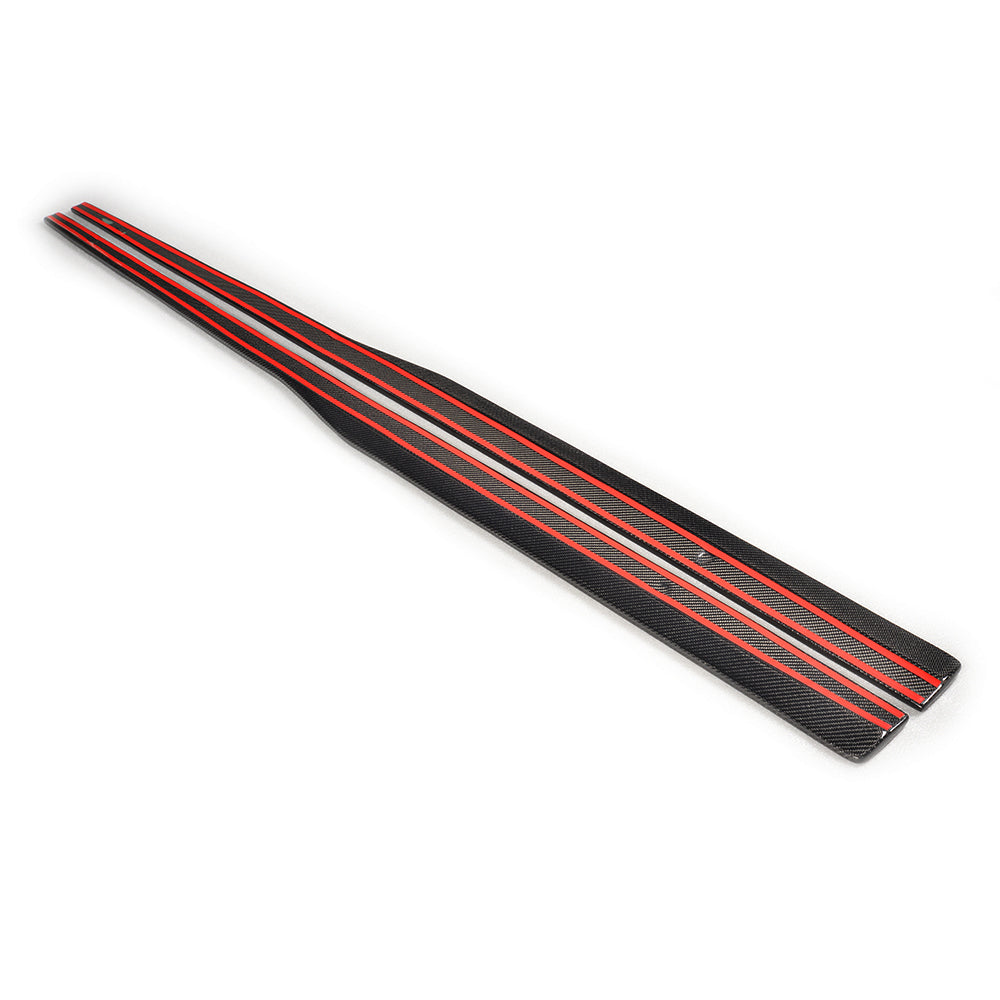 Carbon fiber side skirts for VW Golf GTD and GTI MK7/7.5 2014-2020 by CT Carbon, shown on a sleek blue Golf.