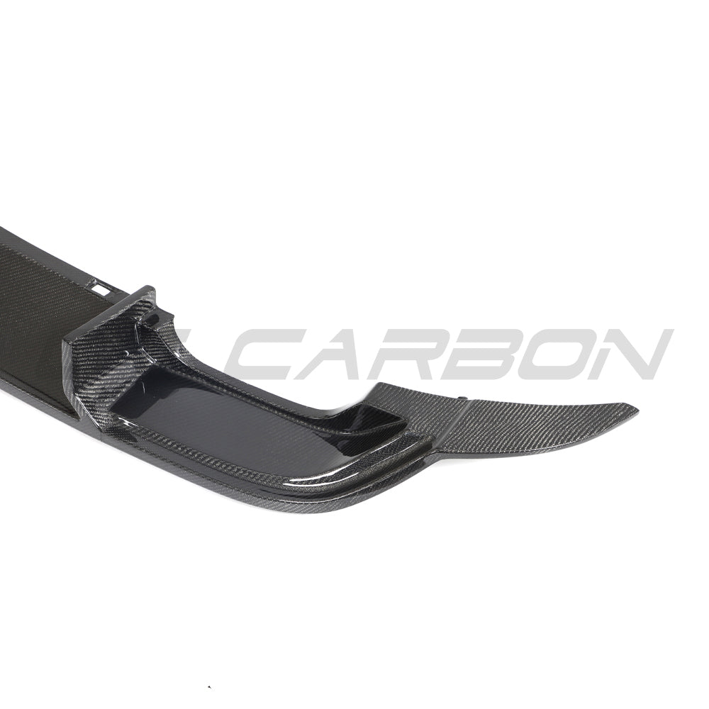 VW Golf R MK7 carbon fibre diffuser by CT Carbon, showcasing the sleek, textured carbon fiber design on the rear of the vehicle.
