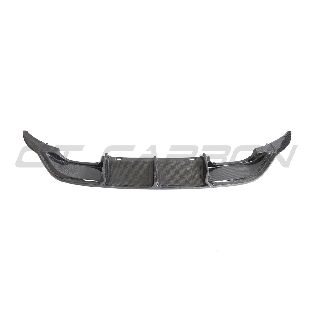 VW Golf R MK7 2014-2017 CT Carbon carbon fiber diffuser with sleek design and aerodynamic features, fitted on the rear of the vehicle.
