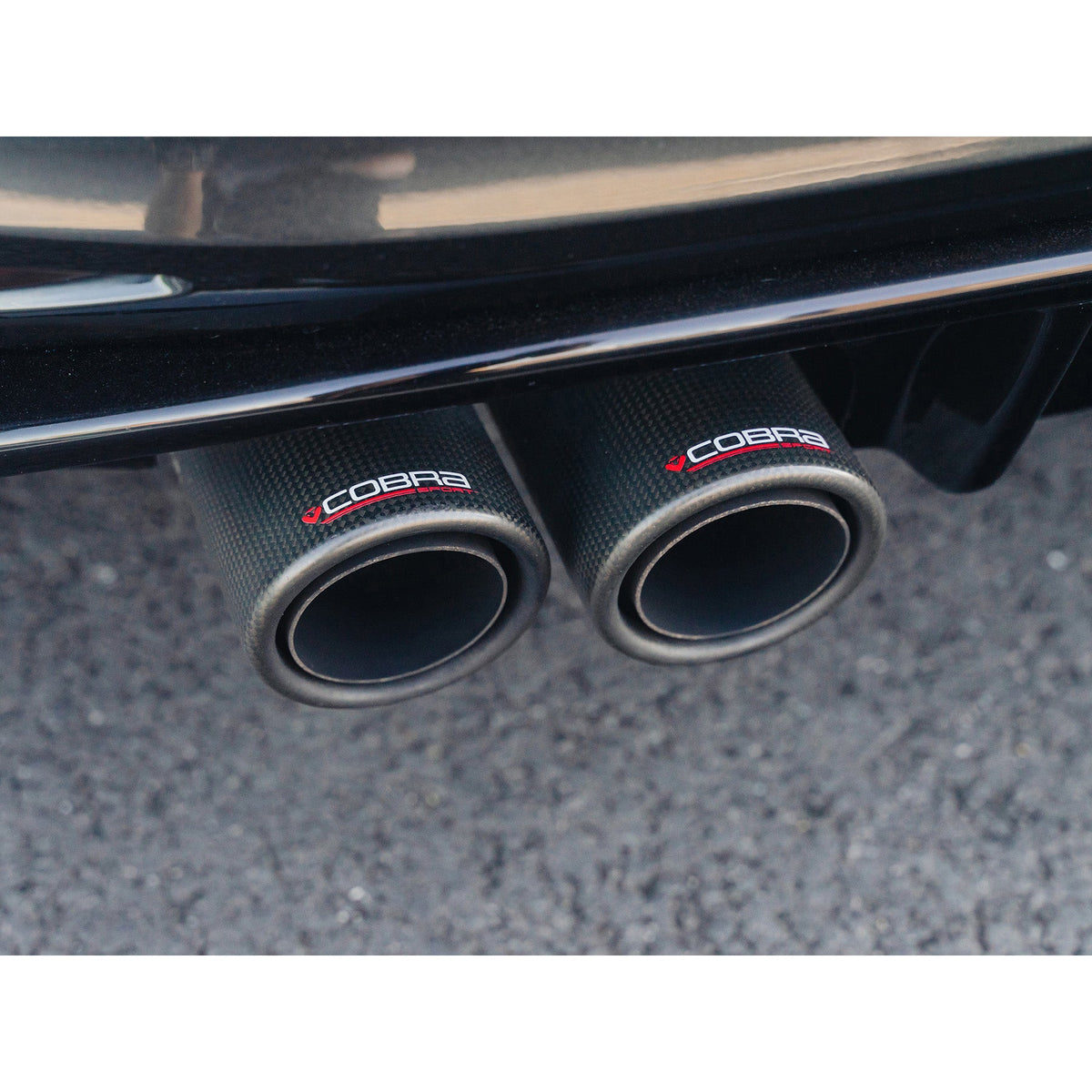 Cobra Sport VW Golf GTI Mk7 2.0 TSI quad exit race cat back exhaust system in black with chrome tips, performance upgrade for Golf R style.