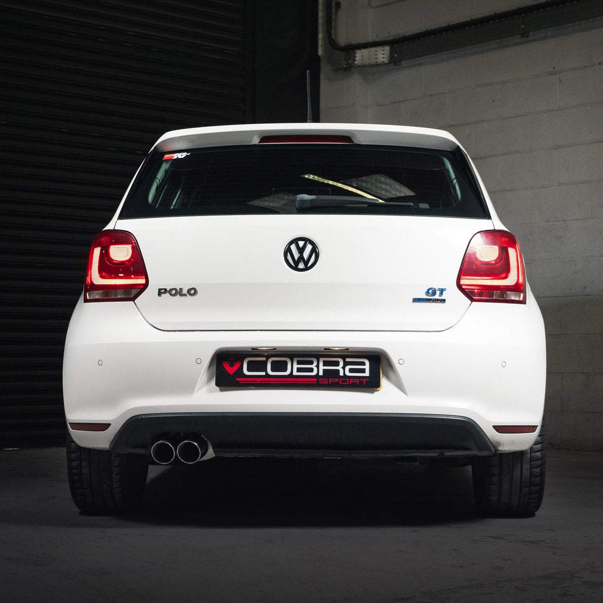 Cobra Sport cat back exhaust for VW Polo BlueGT 1.4 TSI 6R model, showing polished exhaust tips and stainless steel piping.