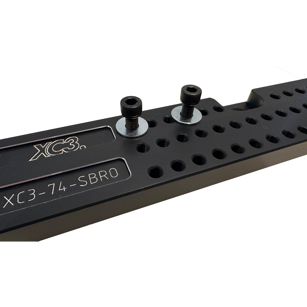 BMW M2 M3 M4 F8X F80 F82 F87 bucket seat base floor mount adapter by XC3 Engineering, shown installed on vehicle floor.