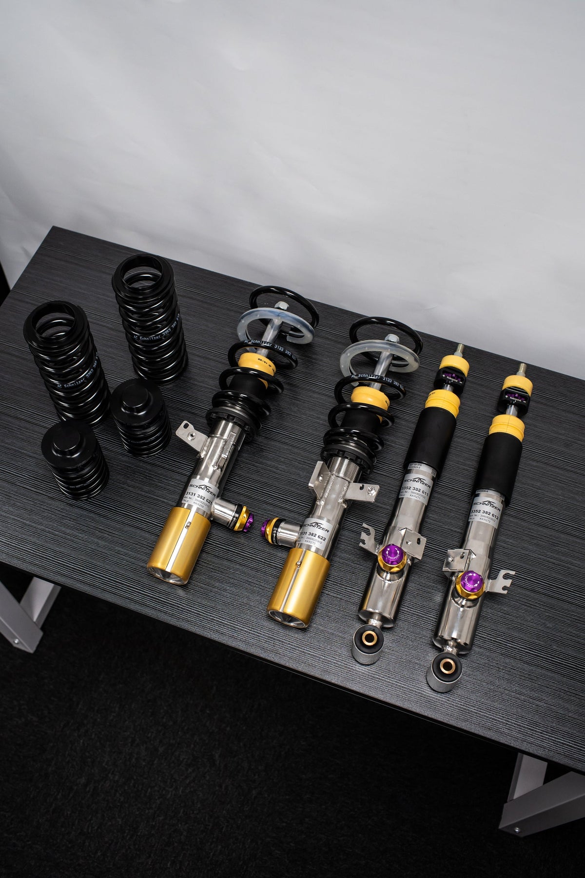AC Schnitzer BMW M3 G80 RS adjustable coilover suspension showcasing sleek, high-performance suspension components.