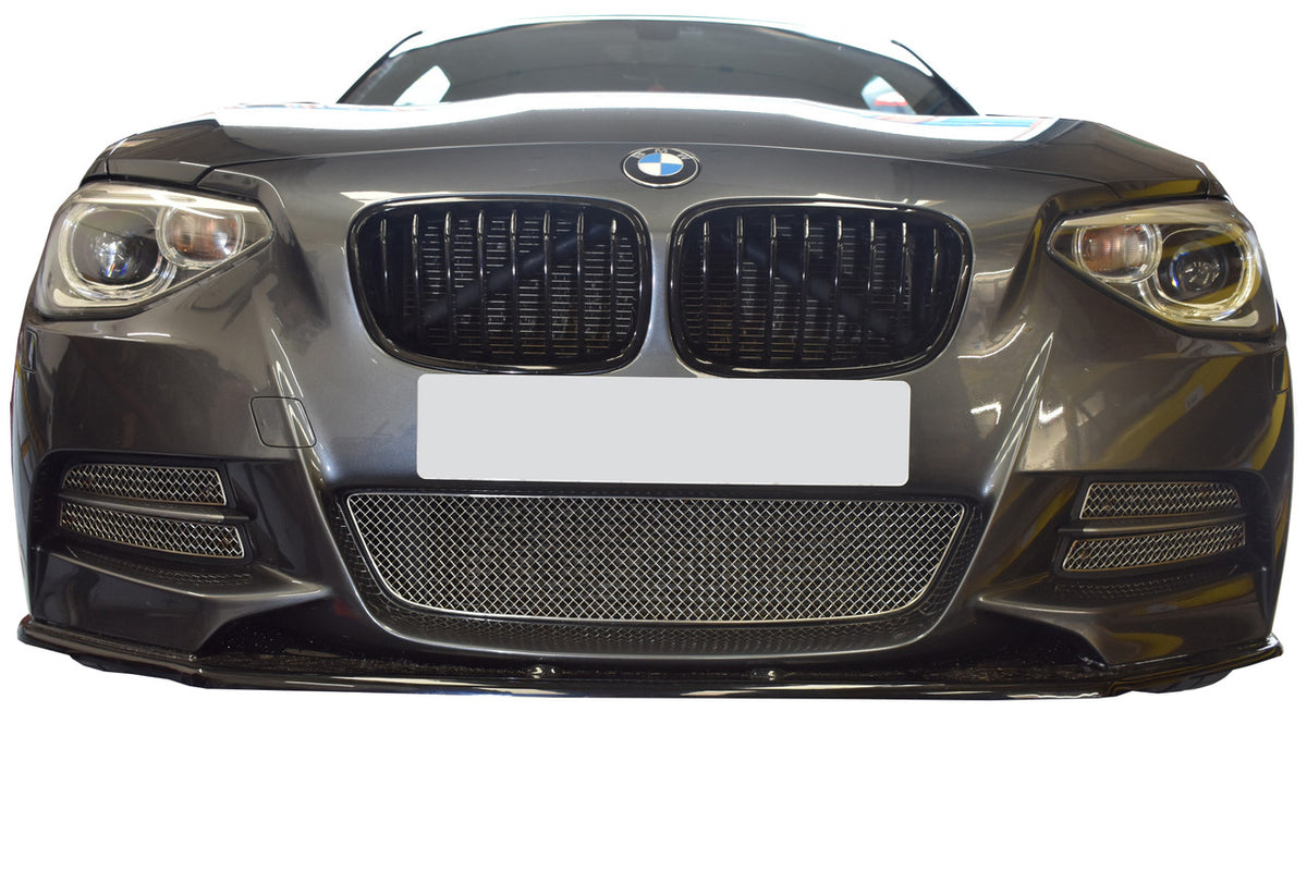 ZunSport BMW M135i front grille set showing sleek black design and detailed grille pattern for sporty appearance.
