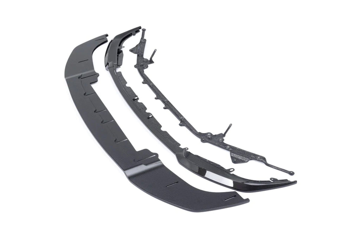 AlphaN carbon adjustable front splitter for BMW G87 M2, enhances aerodynamics and sporty look for Class 3 front splitter upgrade.