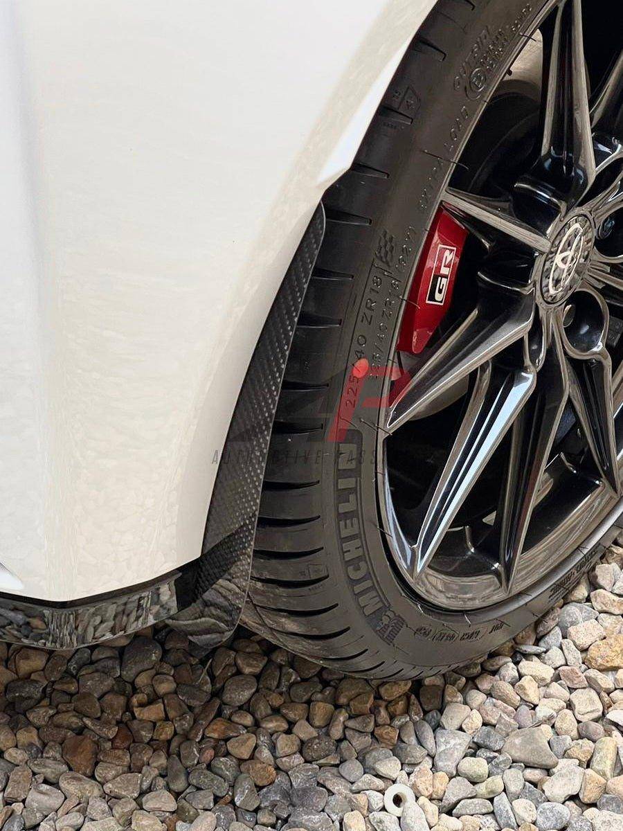Carbon fibre arch guard set for Toyota Yaris GR 2020+ by Automotive Passion, designed to protect wheel arches with a sleek finish.