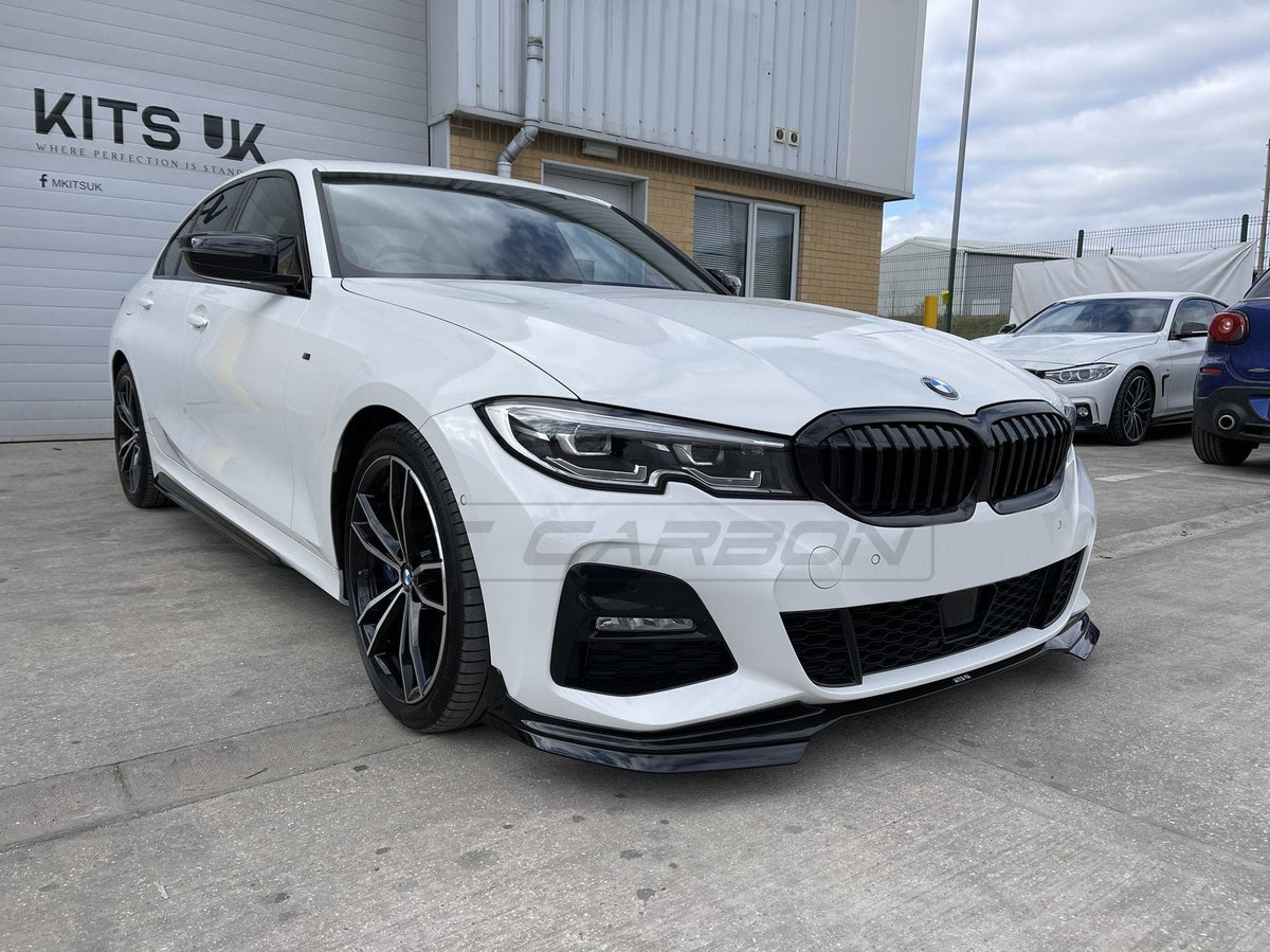 BMW 3 Series G20 G21 pre-LCI gloss black splitter by CT Carbon, front splitter with MP style design, on a black vehicle.