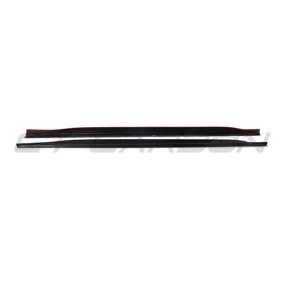 Black BMW G22 4 Series carbon fibre side skirts and diffuser kit by CT Carbon, showcasing sporty aerodynamic enhancements.