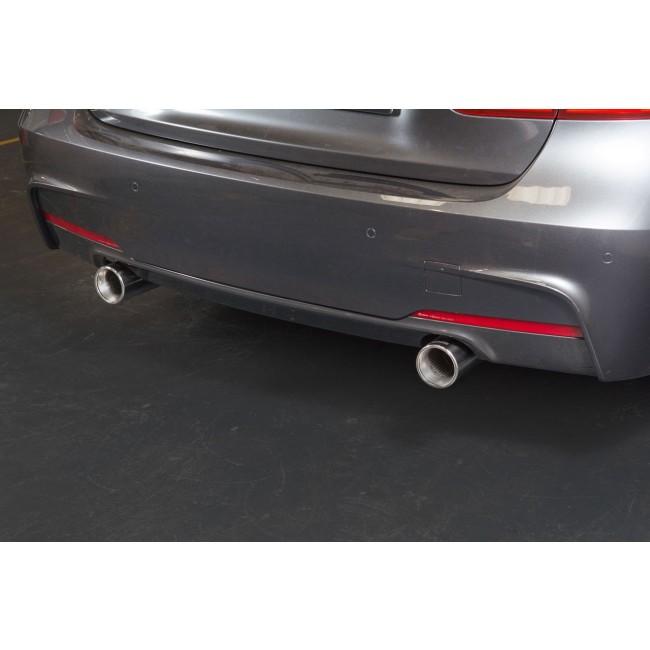 Cobra Sport BMW 335D F30 dual exit exhaust conversion with dual pipes and polished finish on a silver car.